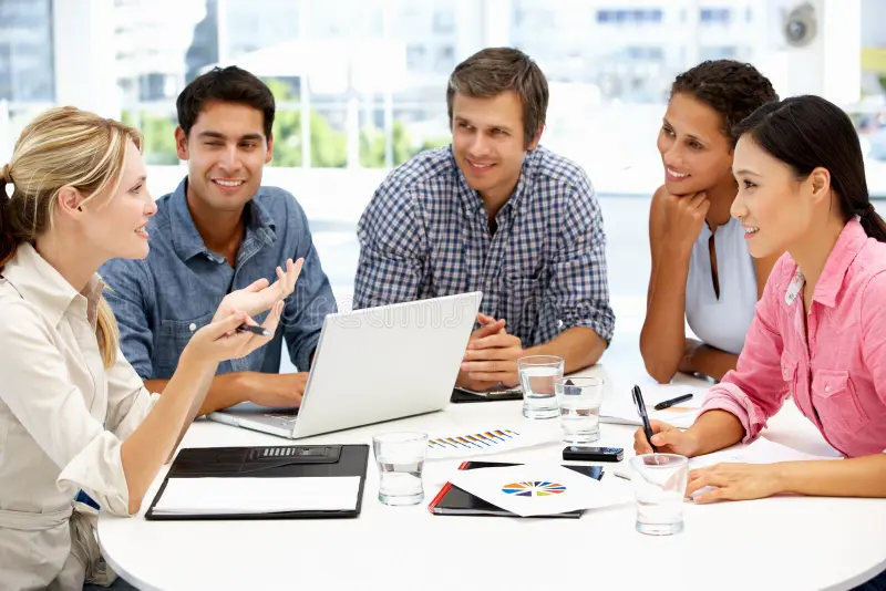 mixed-group-around-table-business-meeting-21283913